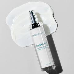 Skincare bottle labeled 'colorescience' on a light gray background