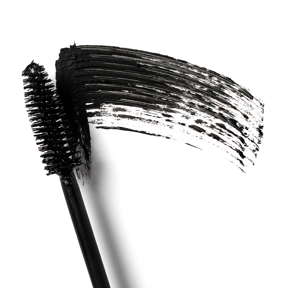 Black mascara wand with a swatch of black mascara on a white background
