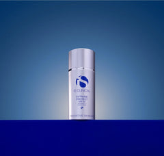 IS Clinical Extreme Protect SPF 50 skincare bottle on a blue gradient background