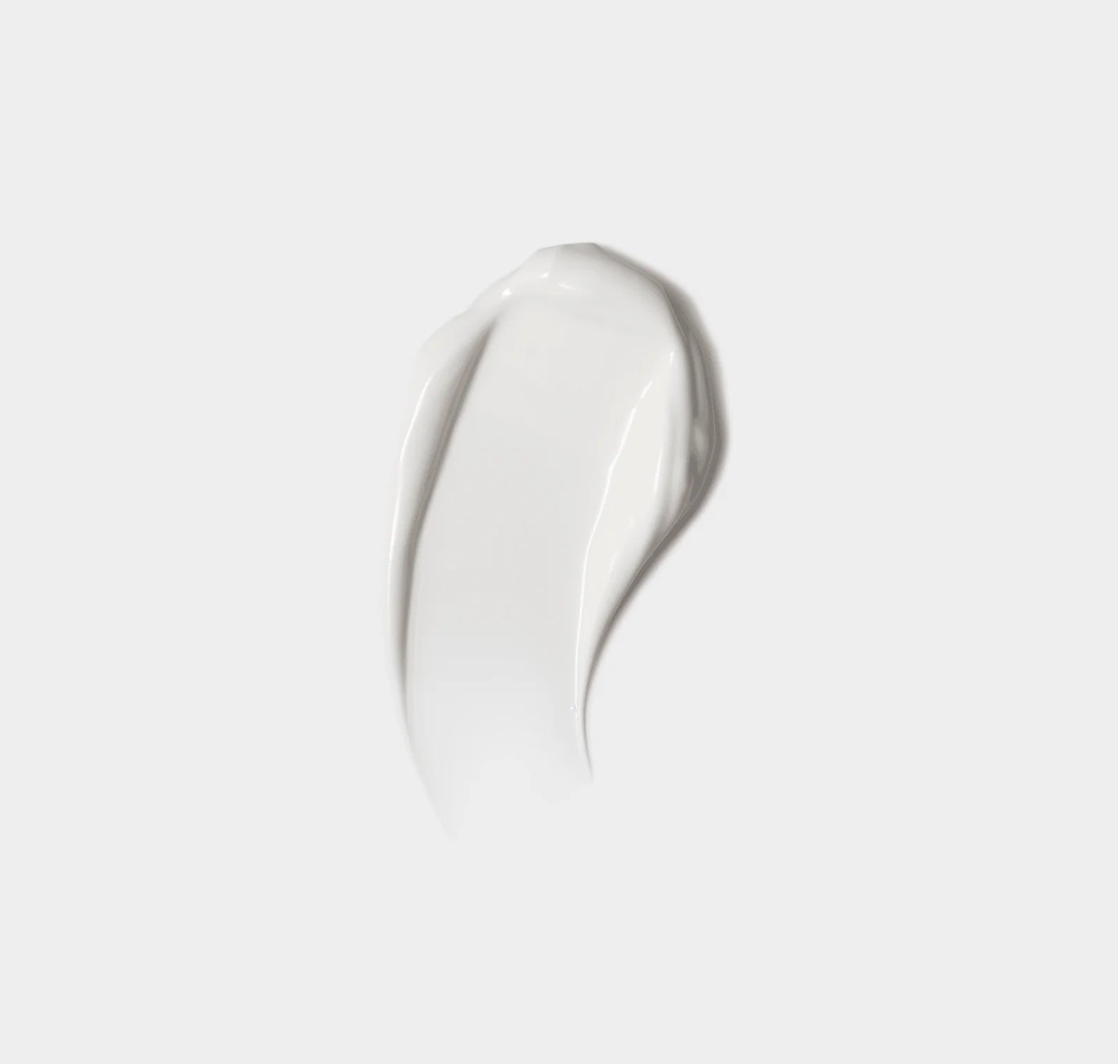 White cream swatch on a light gray background