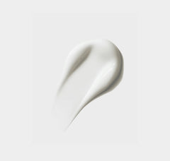White cream swatch on a light gray background
