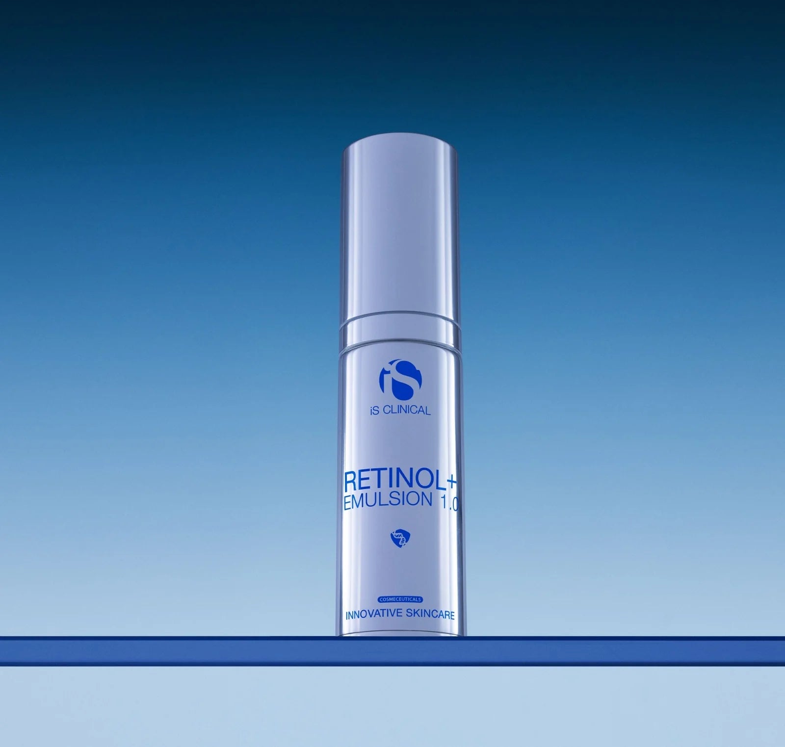 Skincare bottle labeled 'Retinol Emulsion' on a blue gradient background