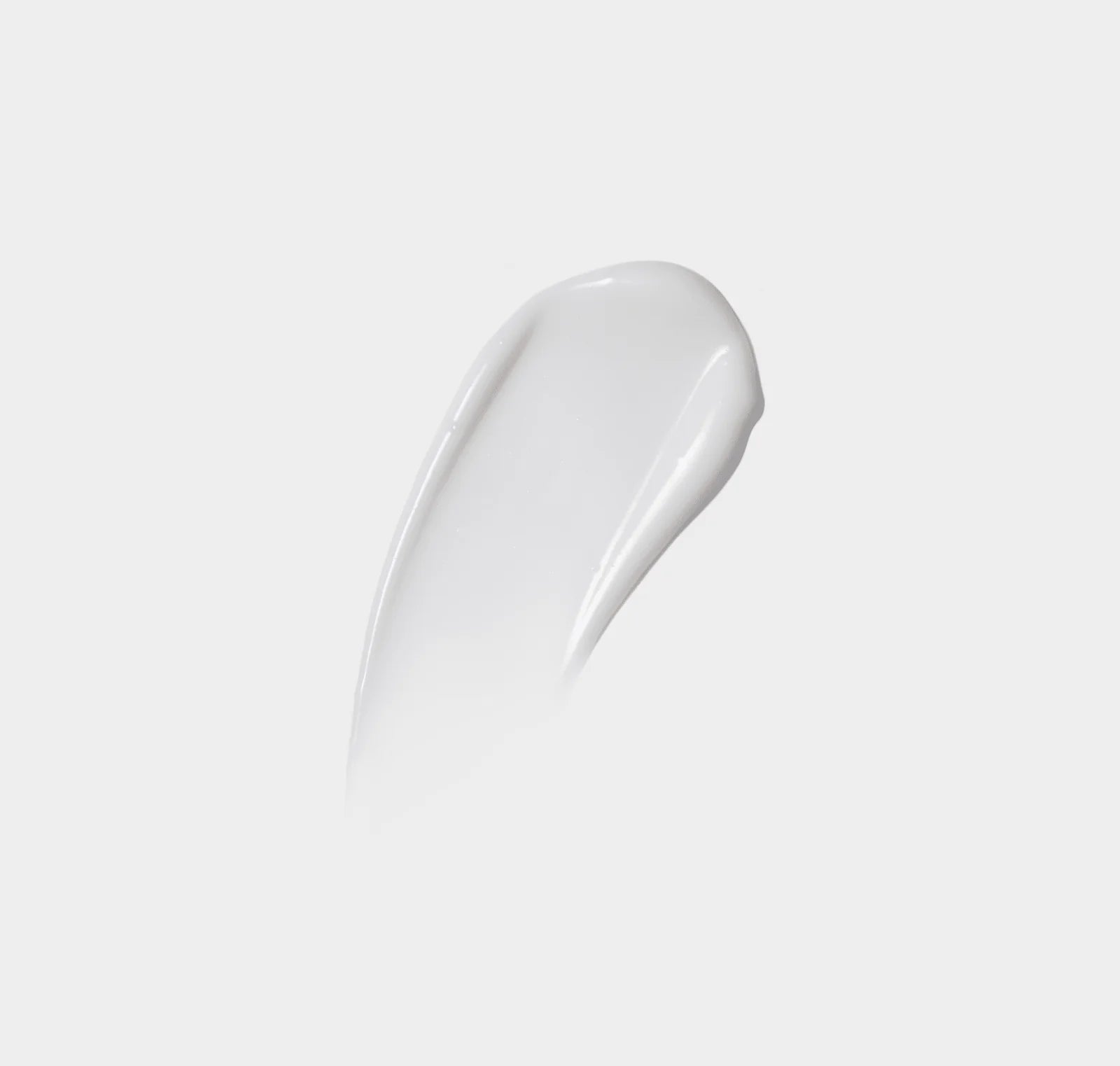 White cream swatch on a light gray background
