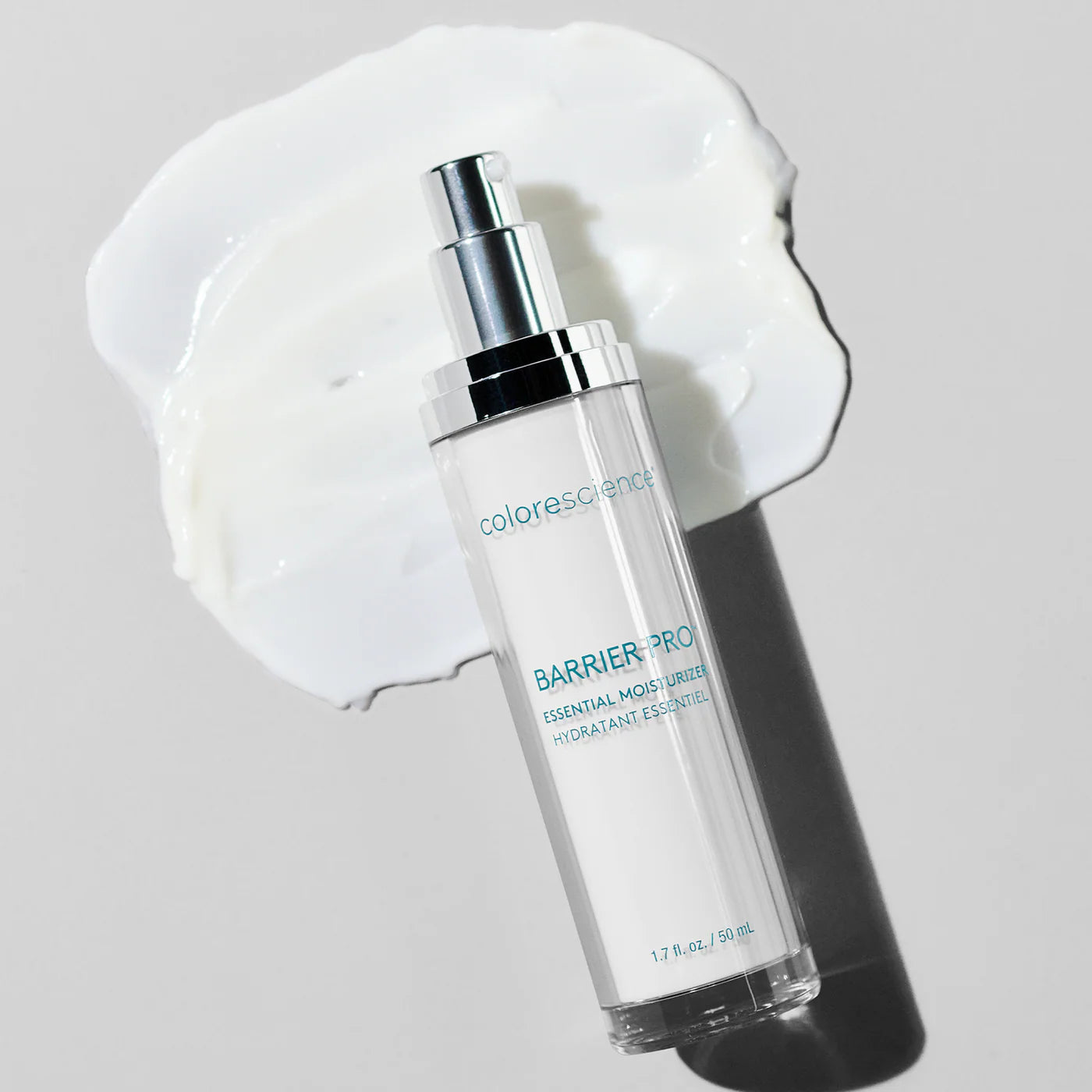 Skincare bottle labeled 'colorescience' on a light gray background