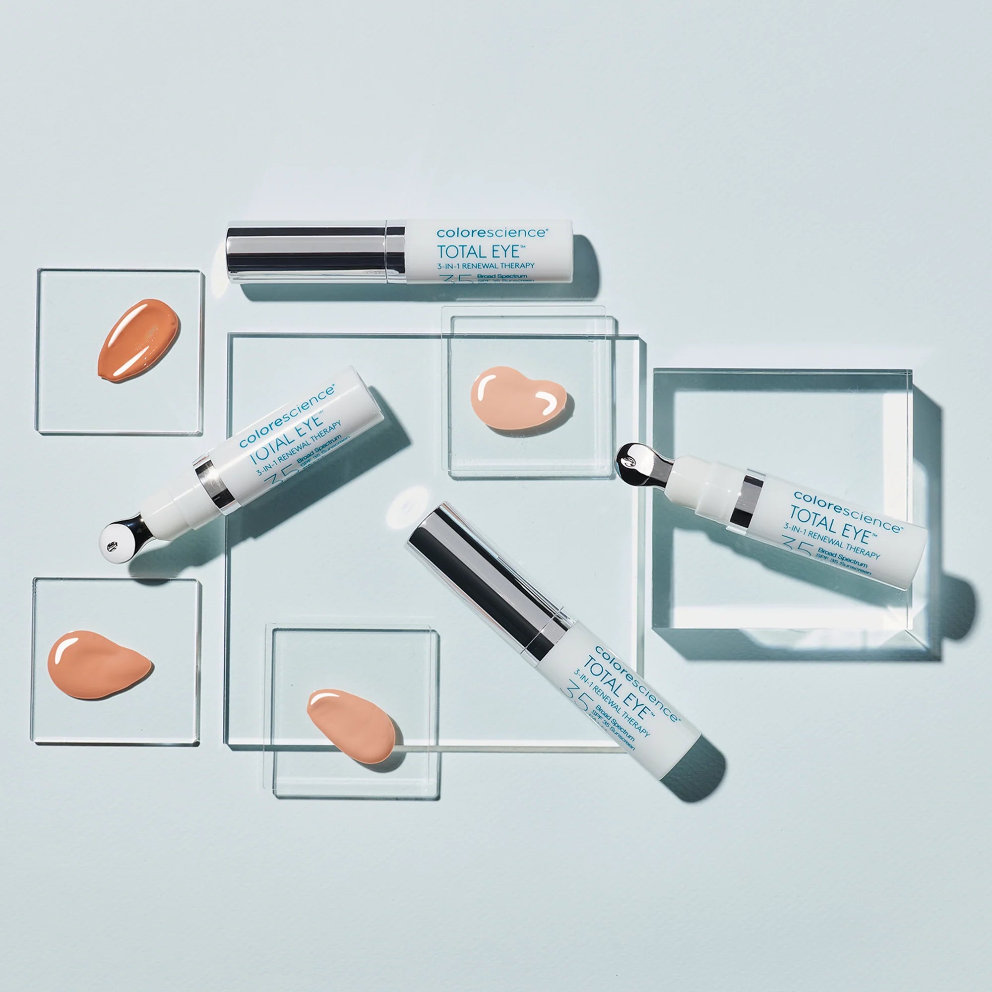 Cosmetic products with 'Colorescience' branding on a light blue background