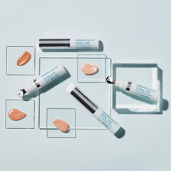 Cosmetic products with 'Colorescience' branding on a light blue background