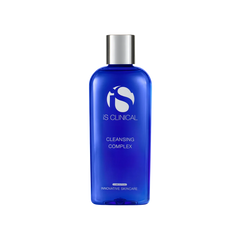 Blue bottle of IS Clinical Cleansing Complex on a white background