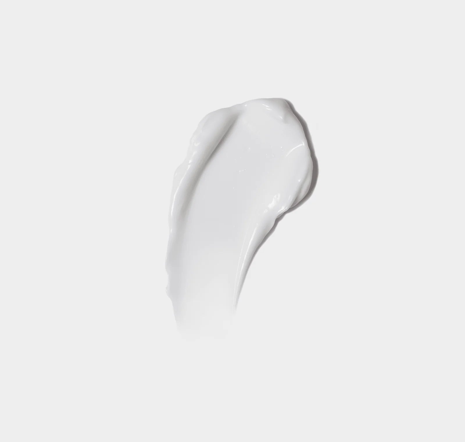 White cream swatch on a light gray background