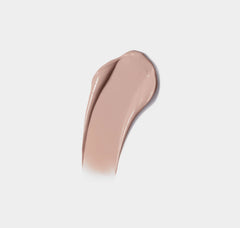 Beige makeup swatch on a light gray background