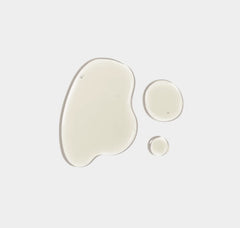 Three different sizes of white gel pads on a light gray background