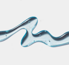 Blue liquid flow on a light gray background