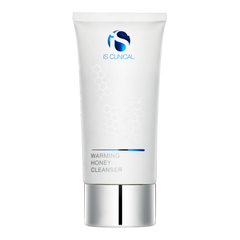 Tube of IS Clinical Warming Honey Cleanser on a white background