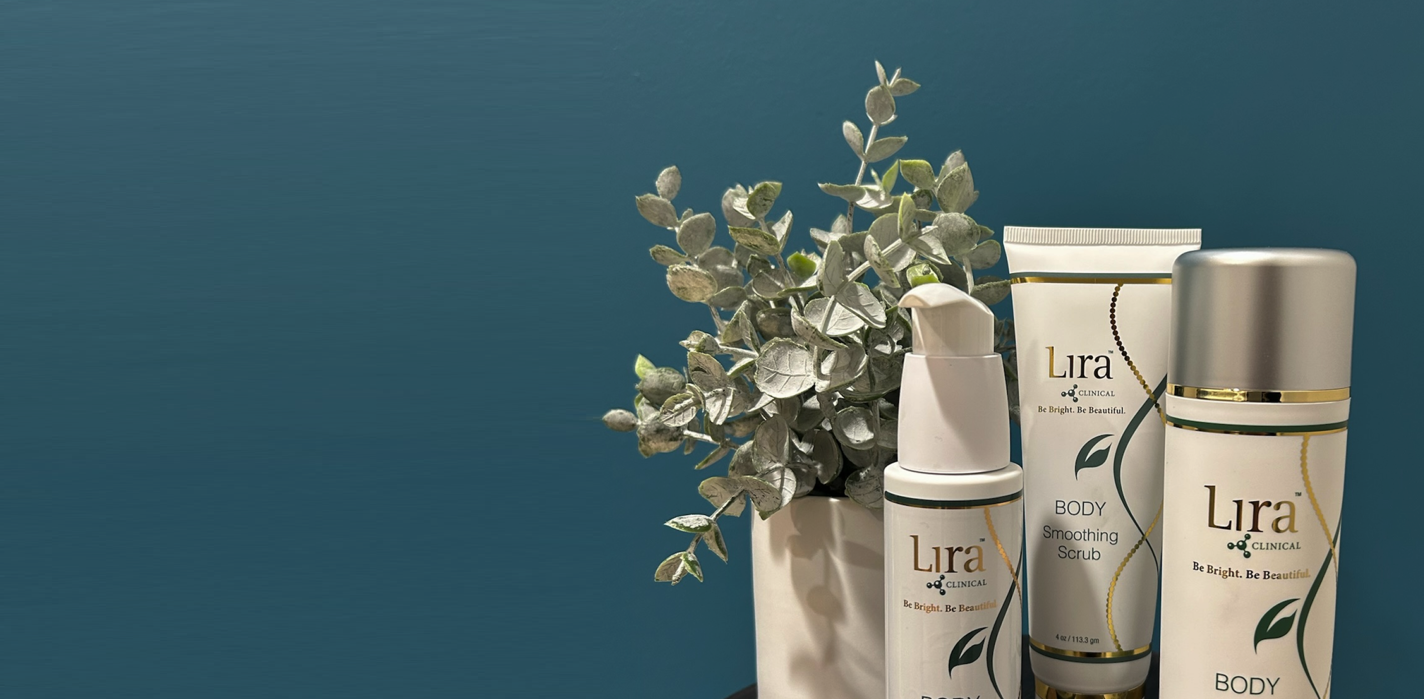 Lira skincare products with a plant on a blue background