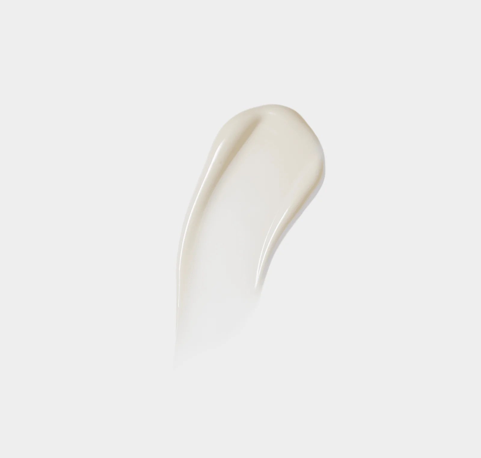 White cream swatch on a light gray background