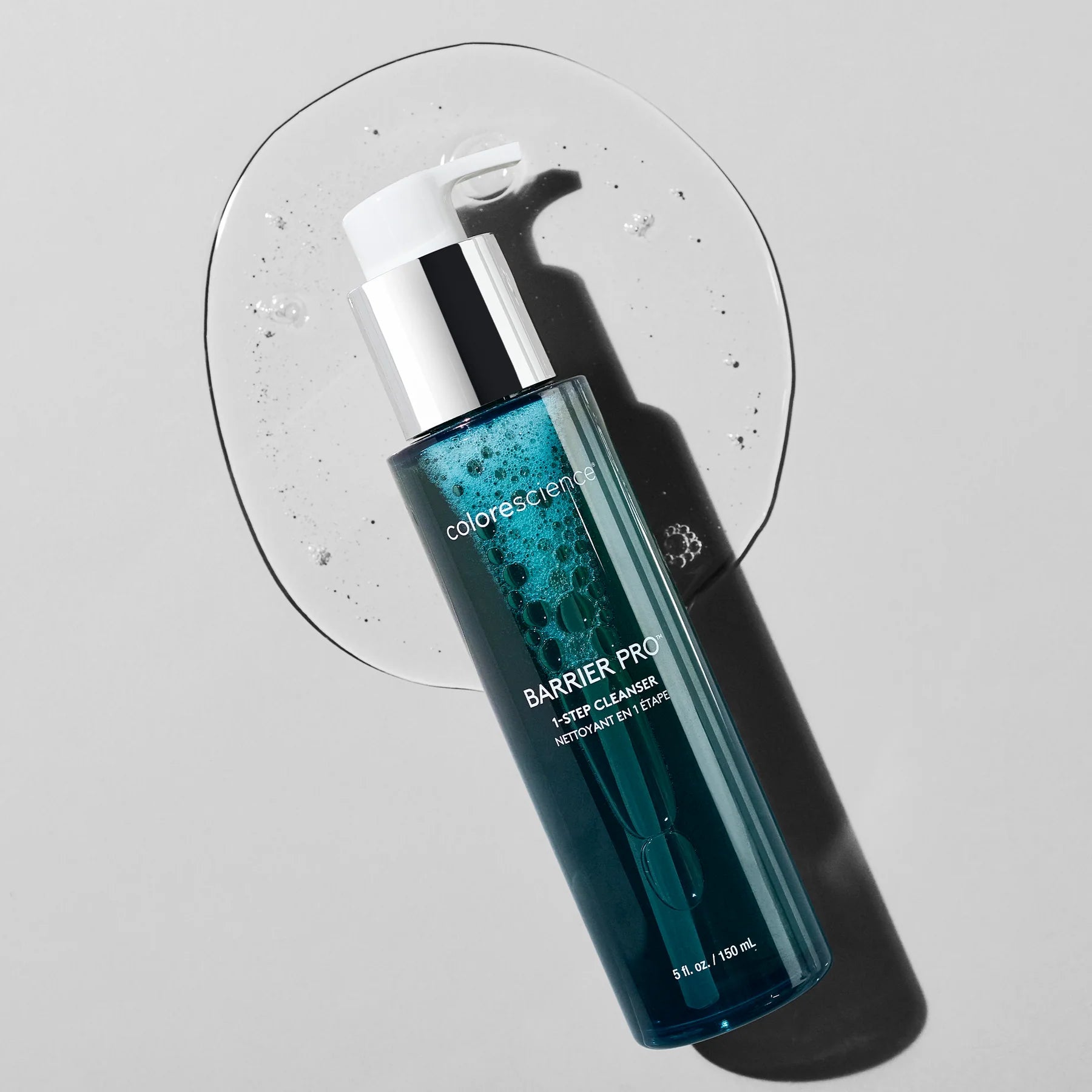 Cosmetic bottle labeled 'Barrier Pro' on a gray background